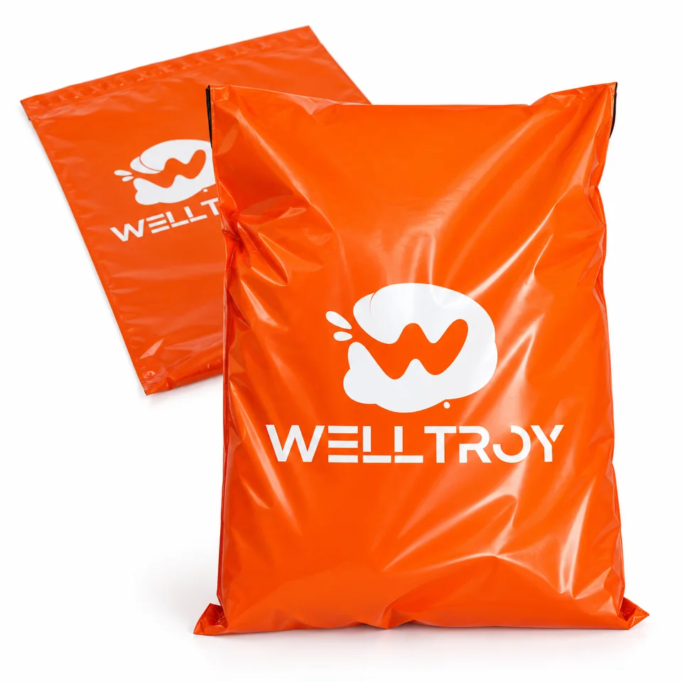 Orange Welltroy-branded poly mailers for apparel shipping